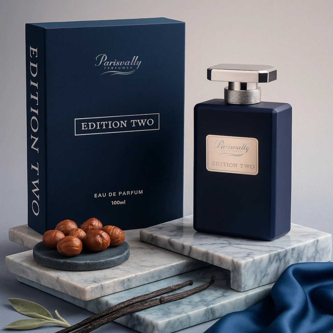 Parfum bottle and packaging with 'Parisvalley' branding on a marble surface.