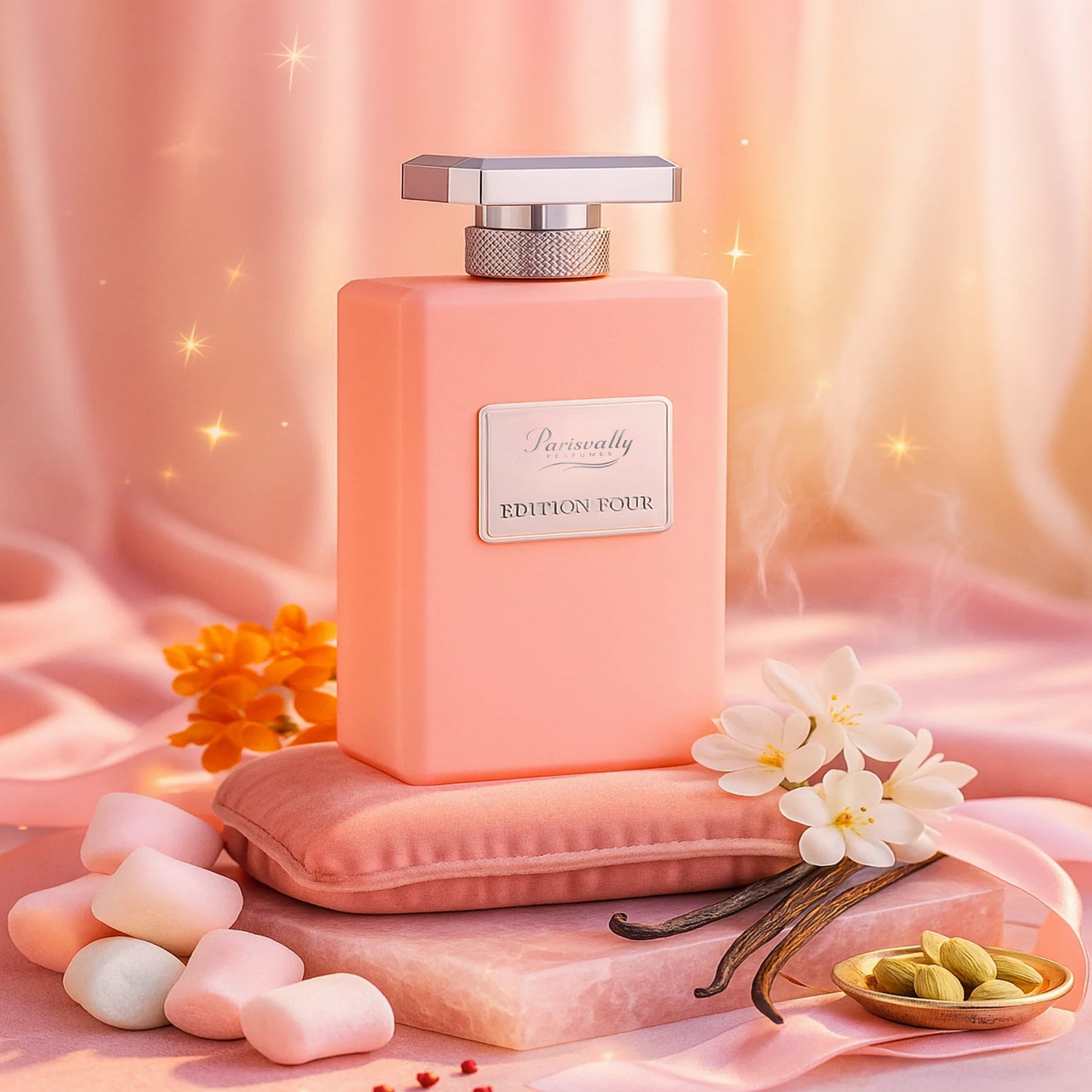 Pink perfume bottle with vanilla beans and flowers on a soft pink background