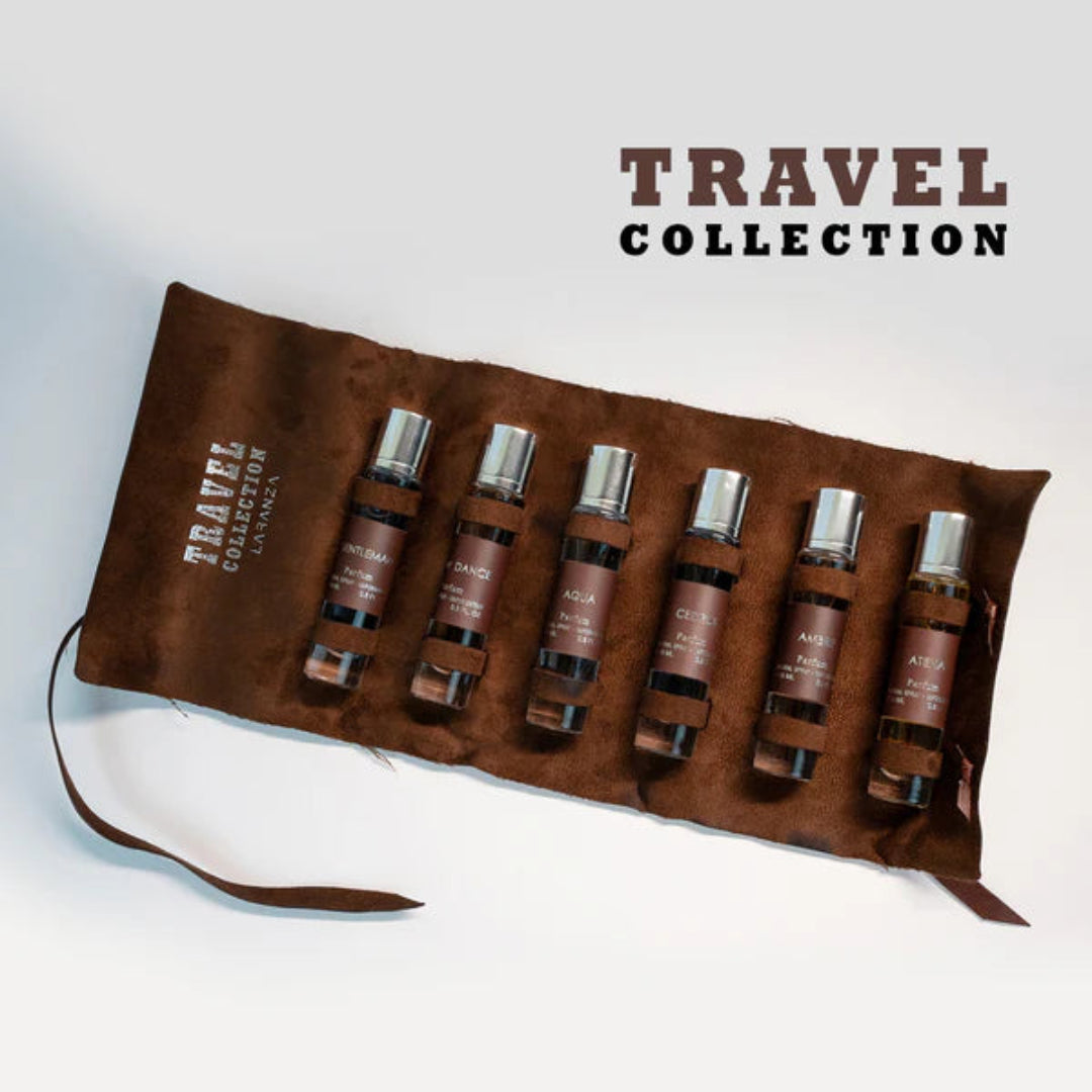 Set of six small perfume bottles on a brown travel case with 'Travel Collection' branding.