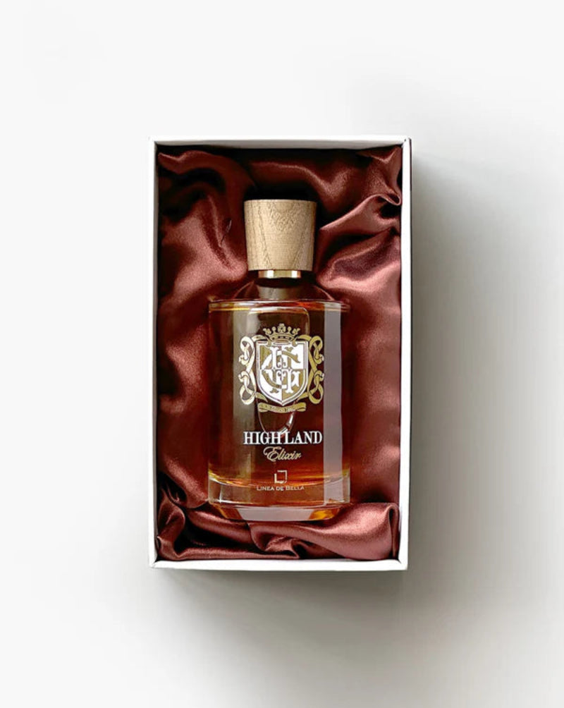 Highland Clan whisky bottle in a decorative box with red satin lining