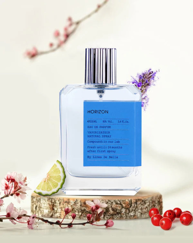 Horizon perfume bottle with decorative elements on a light background