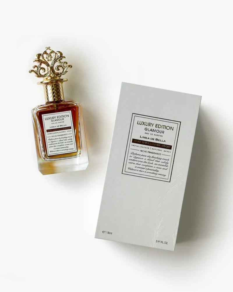 Perfume bottle and packaging with 'Luxury Edition Glamour' text on a white background