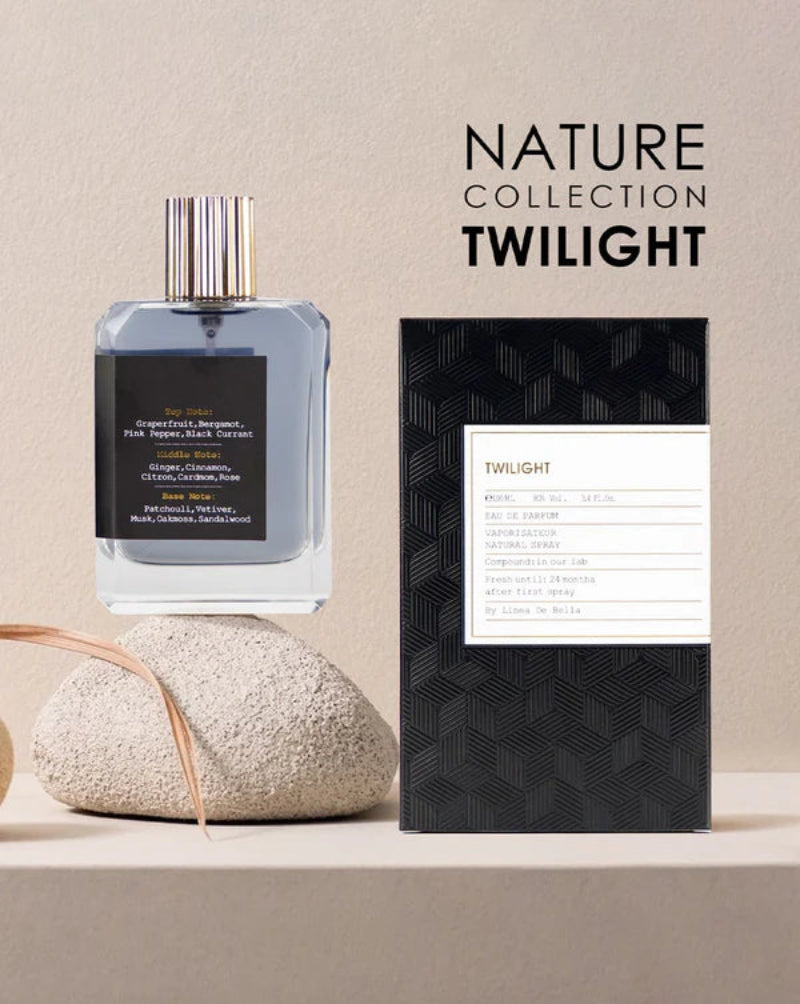 Perfume bottle and packaging with 'Nature Collection Twilight' text on a beige background